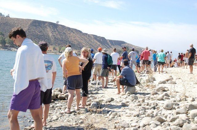 Fans lining the shore at Castaic Lake. Photo: Anne Lepesant
