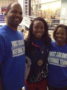 Simone Manuel with her parents after she made the 2013 World Championship team. Photo courtesy of Sharron Manuel