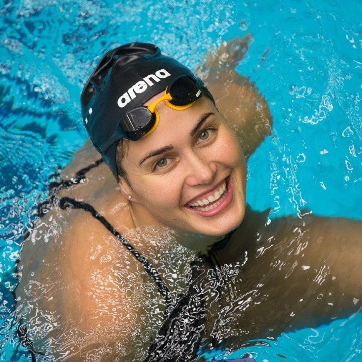 Which Comes First, the Smile or the Fast Swim?