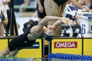 Amy Bilquist on her backstroke take-off during the 400 Medley Relay/Tim Binning/TheSwimPictures.com