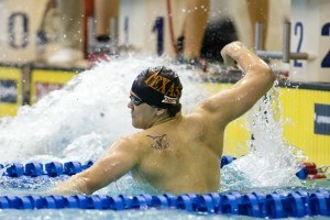 Joseph Schooling celebrates his record-setting win in the 200 fly. (Photo Courtesy: Tim Binning/TheSwimPictures.com)