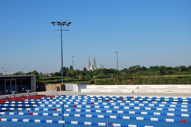 Chartres, outdoor pool with the famous cathedral in the Background 