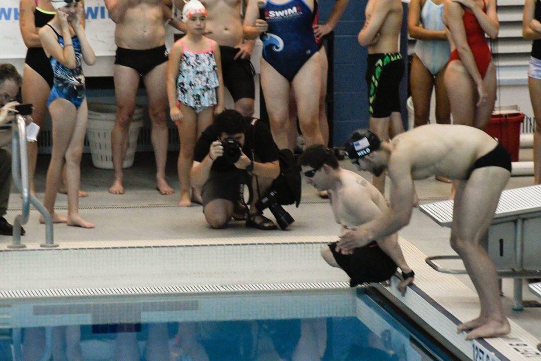 Ryan Held & Veteran Tim Payne Participate In Swim Across America