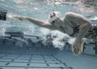 Katie Ledecky Swimming underwater by Mike Lewis