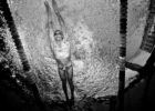 Olympic Champion Swimmer Caeleb Dressel underwater by Mike Lewis