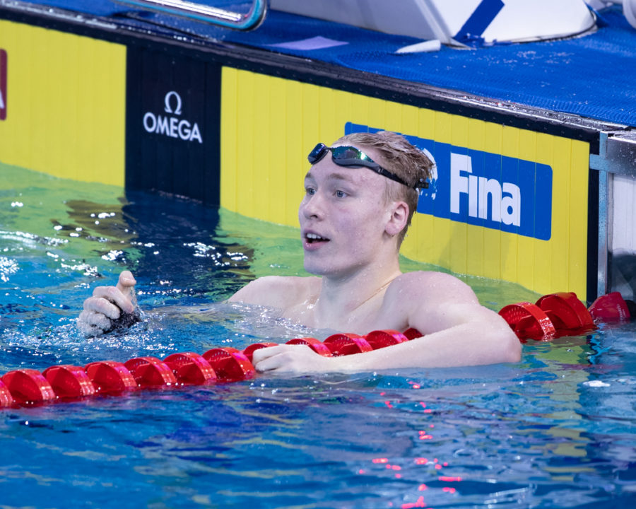 Andrei Minakov Clips Own Russian Record in 100 Fly In Silver Medal Effort