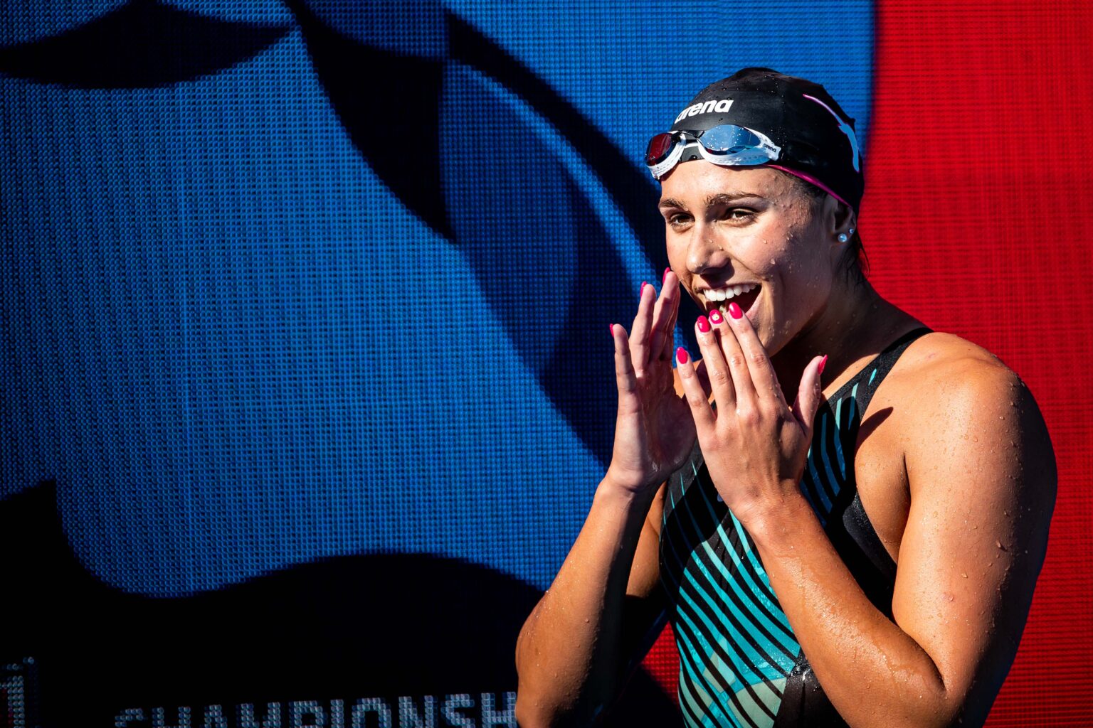 Texas Women's 400 Medley Relay Team Breaks Big 12 Record Behind Kelly