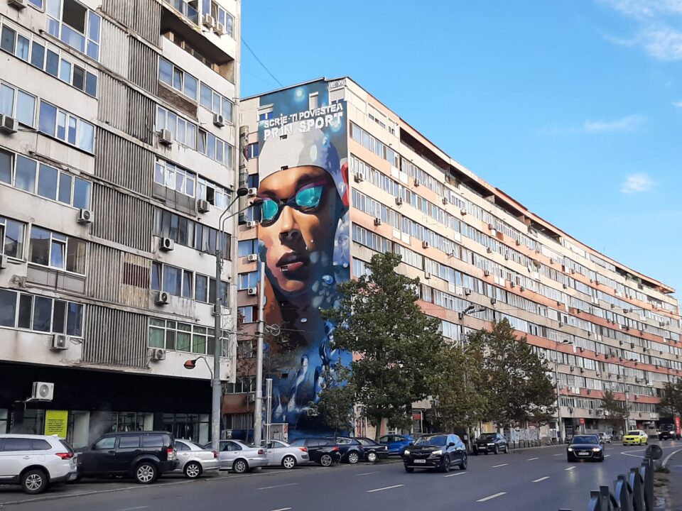 Popovici: Il Volto Di Un Paese Intero, Un Enorme Murales A Bucarest Con La Sua Immagine