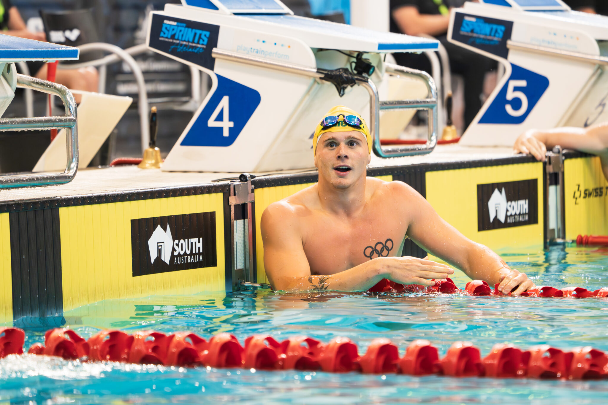 Miron Lifintsev Sets World Junior Record With 22.47 50 Back, Cooper