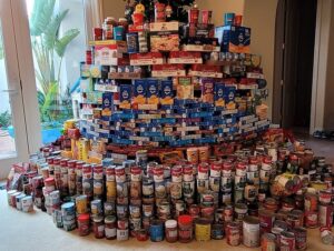 Wolverine Aquatics Club Donates More Than 2100 Cans for the Holidays