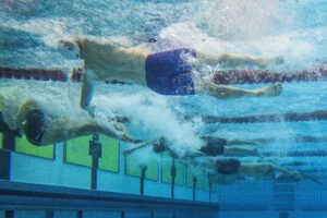 Elliot Leasure Destroys 13-14 NAG Record in 50 Back, Blasts 26.00 at AQJT Summer Spectacular